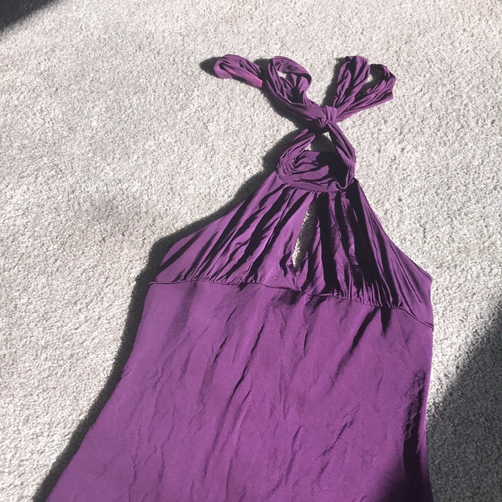 Bebe turtle neck with open back shirt